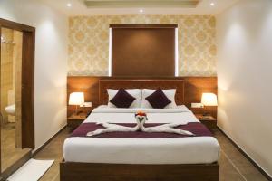 Hotel Nova Pride客房内的一张或多张床位