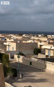 a view of a city with buildings and a street at شاليه مرسي مطروح قرية السعودية in Marsa Matruh