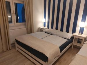 Кровать или кровати в номере Bajkowy Las