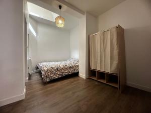 Postel nebo postele na pokoji v ubytování Appartement cosy hyper centre