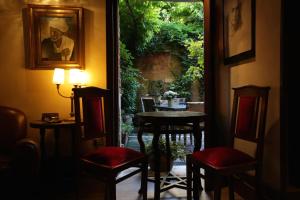 Posedenie v ubytovaní Novecento Boutique Hotel