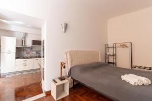 Ένα ή περισσότερα κρεβάτια σε δωμάτιο στο La Spezia and Cinque Terre Apartment