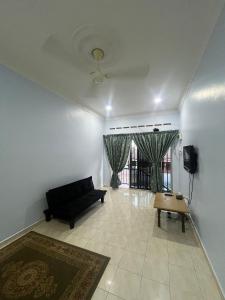 Μια τηλεόραση ή/και κέντρο ψυχαγωγίας στο KHALiFAH HOMESTAY