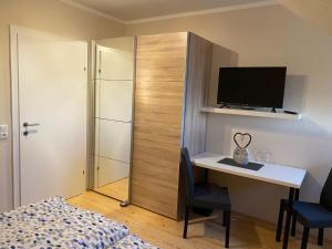 Postel nebo postele na pokoji v ubytování Ferienwohnung Weberschläger