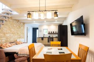 Ένα ή περισσότερα κρεβάτια σε δωμάτιο στο Grand T2 cosy proche Futuroscope