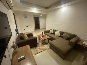 Et sittehjørne på Rabih Furnished Apartments