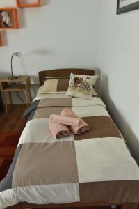 Postel nebo postele na pokoji v ubytování Apartmani Reset