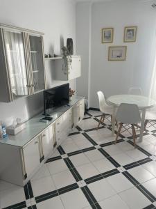 Televisyen dan/atau pusat hiburan di Apartamento SOL