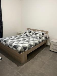 Кровать или кровати в номере la maison de laligier