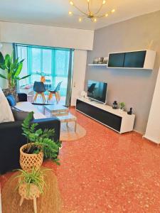 TV a/nebo společenská místnost v ubytování Apartamento Con Vistas al Mar + 18 fotografií