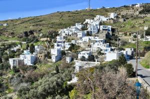 a village on a hill with white houses at La maison, Triandaros in Triandáros