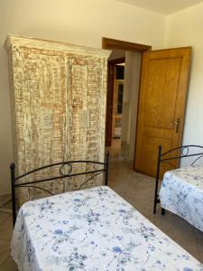 A bed or beds in a room at Villa Laurus