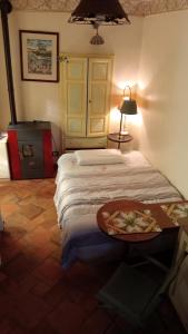 Postel nebo postele na pokoji v ubytování Langhe studio flat