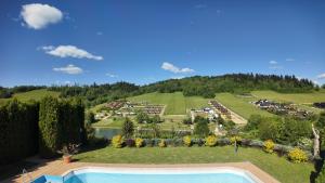 an aerial view of a resort with a swimming pool at Willa Wuja Sama in Zawóz