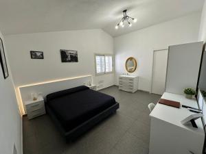 Istumisnurk majutusasutuses LXR Rooms Carloforte