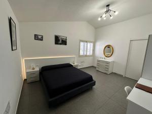 Istumisnurk majutusasutuses LXR Rooms Carloforte