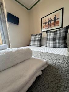 Postel nebo postele na pokoji v ubytování St Olaf Golf Hotel