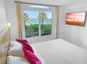 Postel nebo postele na pokoji v ubytování Puerto Velero Primera Línea Primer Piso al lado de la Playa! 5 pax + 37 fotografií