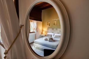 Postel nebo postele na pokoji v ubytování B&B Villa Adriana