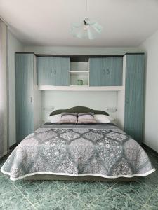 Кровать или кровати в номере Apartmani Mediteran