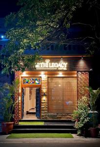 a building with a sign on the front of it at Hotel Sethi Legacy in Haridwār