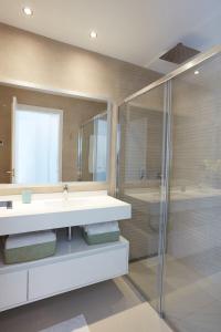 a bathroom with a sink and a shower at Amazing Apartment in Benidorm - Sunset in Benidorm
