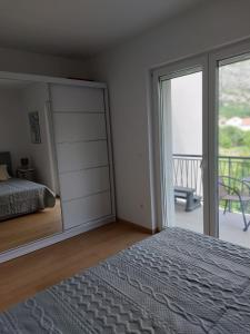 Ένα ή περισσότερα κρεβάτια σε δωμάτιο στο Bella Arte Dubrovnik