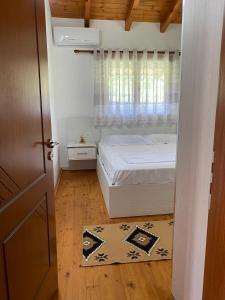 מיטה או מיטות בחדר ב-Arber Apartments 3