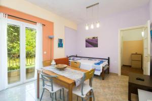 Postel nebo postele na pokoji v ubytování Scorpios Apartments