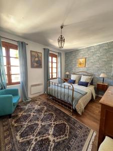 Postel nebo postele na pokoji v ubytování RÉNOVÉ, vue SUR Palais des Papes, terrasse et WIFI TROISIEME ETAGE