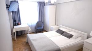 Postel nebo postele na pokoji v ubytování Gościnny Dom Kaola