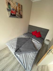 Posteľ alebo postele v izbe v ubytovaní Renáta Apartman
