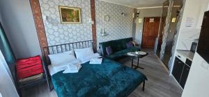 Μια τηλεόραση ή/και κέντρο ψυχαγωγίας στο Apartamenty Hexagon nr 1