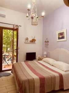 A bed or beds in a room at B&B Rifugio Angelina