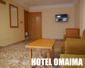 TV a/nebo společenská místnost v ubytování Hotel OMAIMA