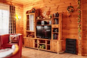 TV a/nebo společenská místnost v ubytování Blockhaus 2