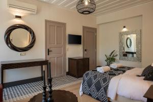 Postel nebo postele na pokoji v ubytování Vranas Ambiance Hotel