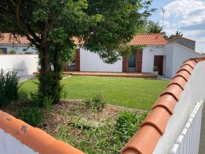 Zahrada ubytování Deux charmantes maisons proche de l'océan.