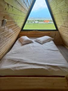 Postel nebo postele na pokoji v ubytování Aframe Bradu