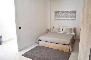 Postel nebo postele na pokoji v ubytování La Casa di Maya & Cloe
