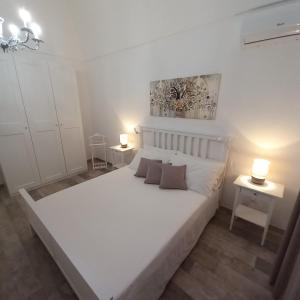 Postel nebo postele na pokoji v ubytování Casa Virgilio