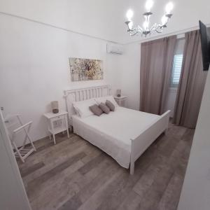 Postel nebo postele na pokoji v ubytování Casa Virgilio