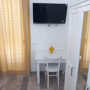 TV a/nebo společenská místnost v ubytování Casa Virgilio
