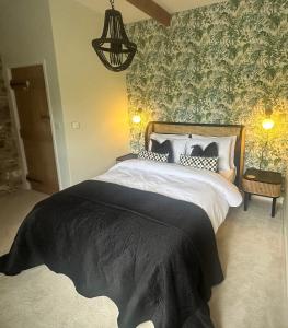 Ένα ή περισσότερα κρεβάτια σε δωμάτιο στο Captain‘s Cottage