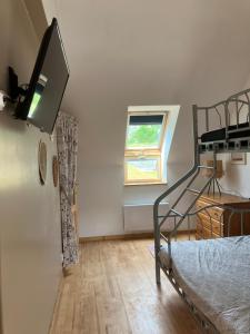 Postel nebo postele na pokoji v ubytování Gîte des champs fondus