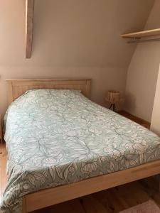 Postel nebo postele na pokoji v ubytování Gîte des champs fondus