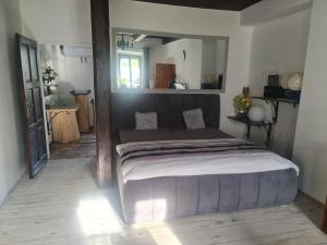 מיטה או מיטות בחדר ב-Apartments with view
