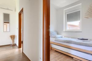 Letto o letti in una camera di Villa Lara 1