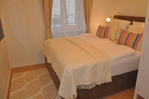 Кровать или кровати в номере Apartment Austria 206 am Traunsee, Gmunden