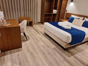 Postel nebo postele na pokoji v ubytování 3M Hostel & Suites